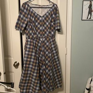 Gray blue yellow white plaid a-line dress with pockets.